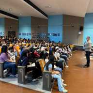 State Sen. John Liu addresses students at P.S. 159Q as part of Civics Week. Photo via State Sen. John Liu.