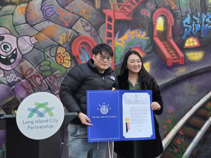 Council Member Julie Won with Master Panda owner Weilun Luo. Photo by Shane O'Brien. 