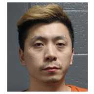 Flushing resident Hao Tung Chen was arrested by federal agents at his 26th Avenue home on Jan. 29 and spent a month on Rikers Island until he was extradited to Oklahoma on Feb. 28.