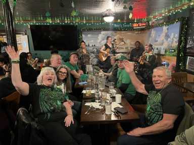 A table of patrons celebrating the St. Patrick's Day festivities at Neir's Tavern in Woodhaven in March 2025.