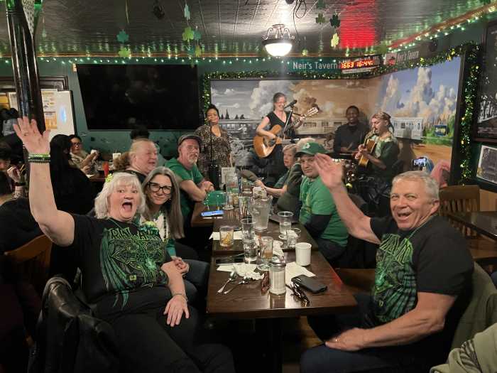 A table of patrons celebrating the St. Patrick's Day festivities at Neir's Tavern in Woodhaven in March 2025.