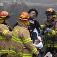 Authorities say three people are dead, including a child, after a four-alarm fire tore through a multi-family residence in Flushing on Monday, March 16.