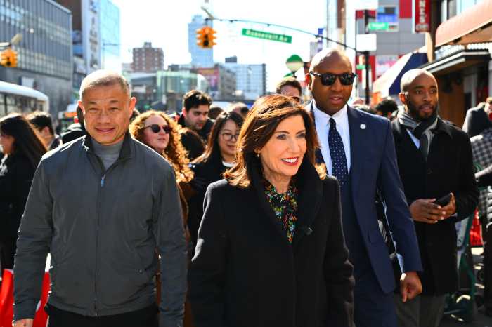 Hochul walks through Flushing with Liu and Richards. Photo by Ramy Mahmoud.