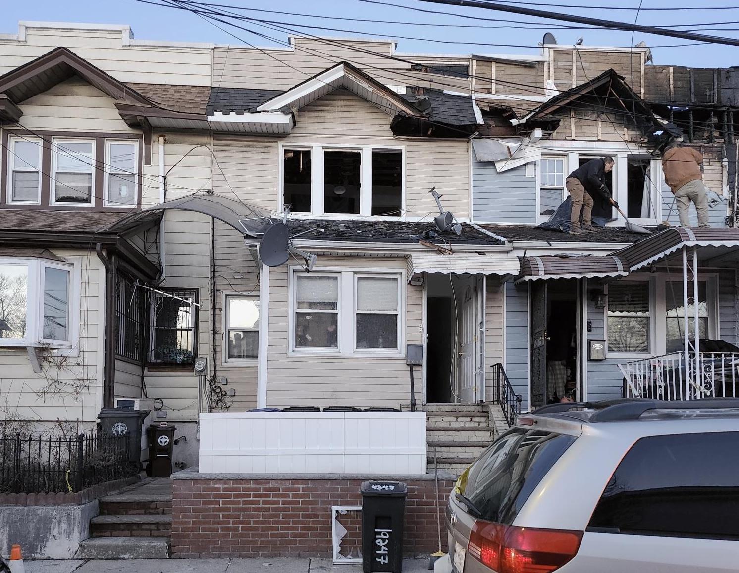 Inspectors from the Department of Buildings ordered full vacate orders for three adjoining homes, displacing six households, as a result of a two-alarm fire in Woodhaven.