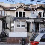 Inspectors from the Department of Buildings ordered full vacate orders for three adjoining homes, displacing six households, as a result of a two-alarm fire in Woodhaven.